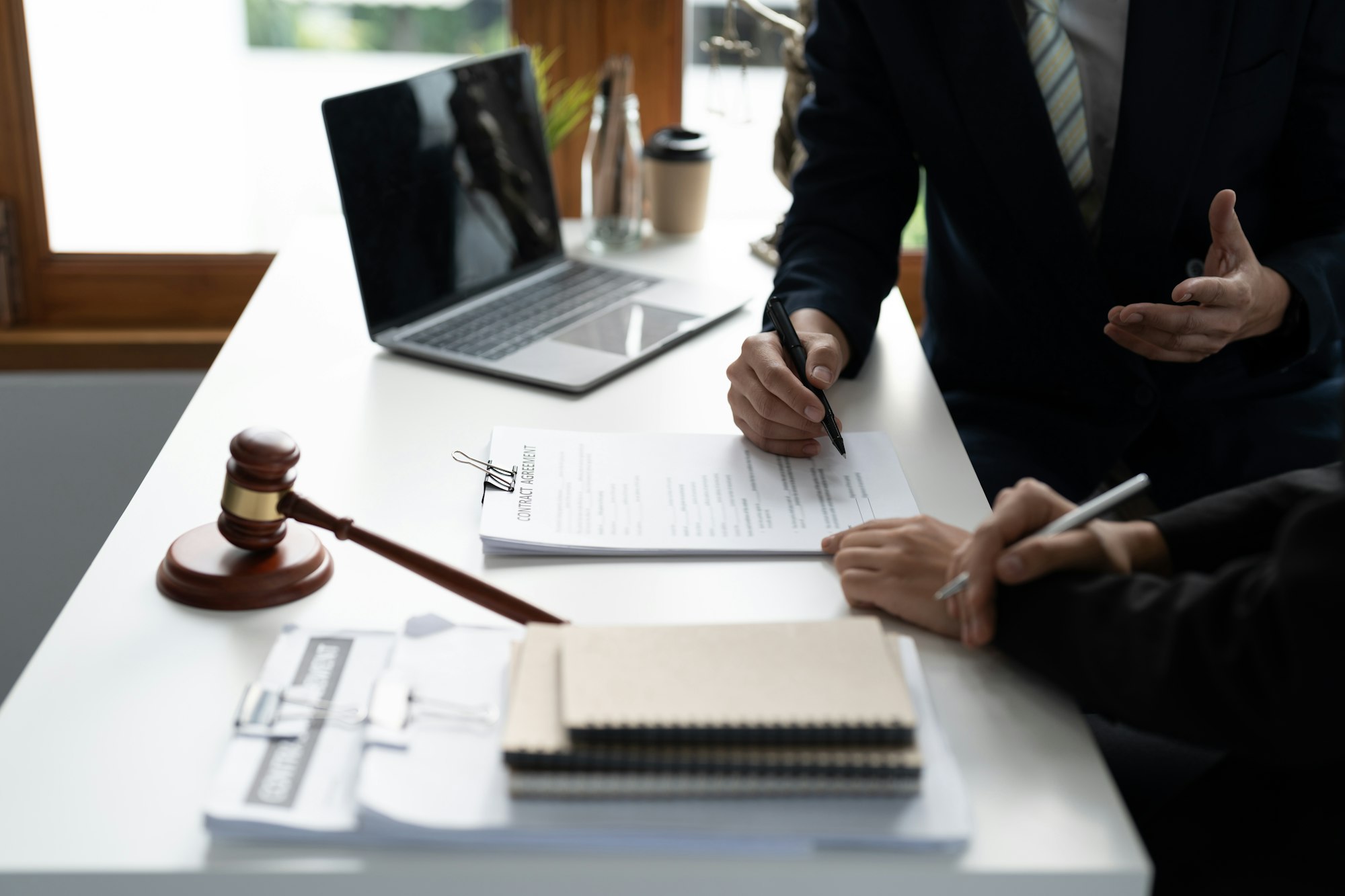 Businessman and lawyer discuss the contract document. Treaty of the law. Sign a contract business.